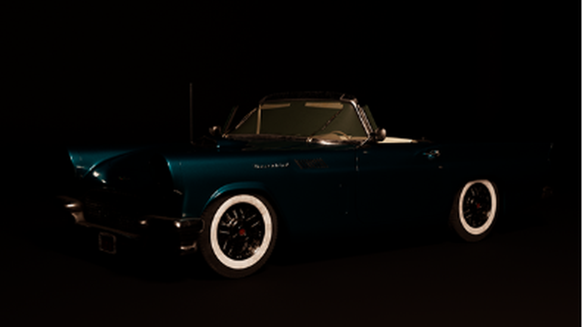 Rear three-quarter beauty render of the teal Thunderbird